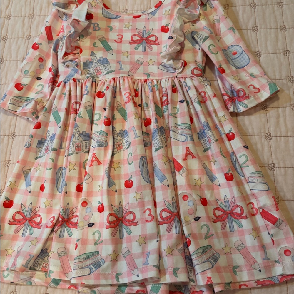 Charming Pink Kids Dress with Playful Print
